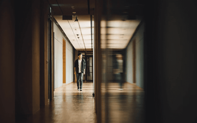 Student walking in a hallway at school