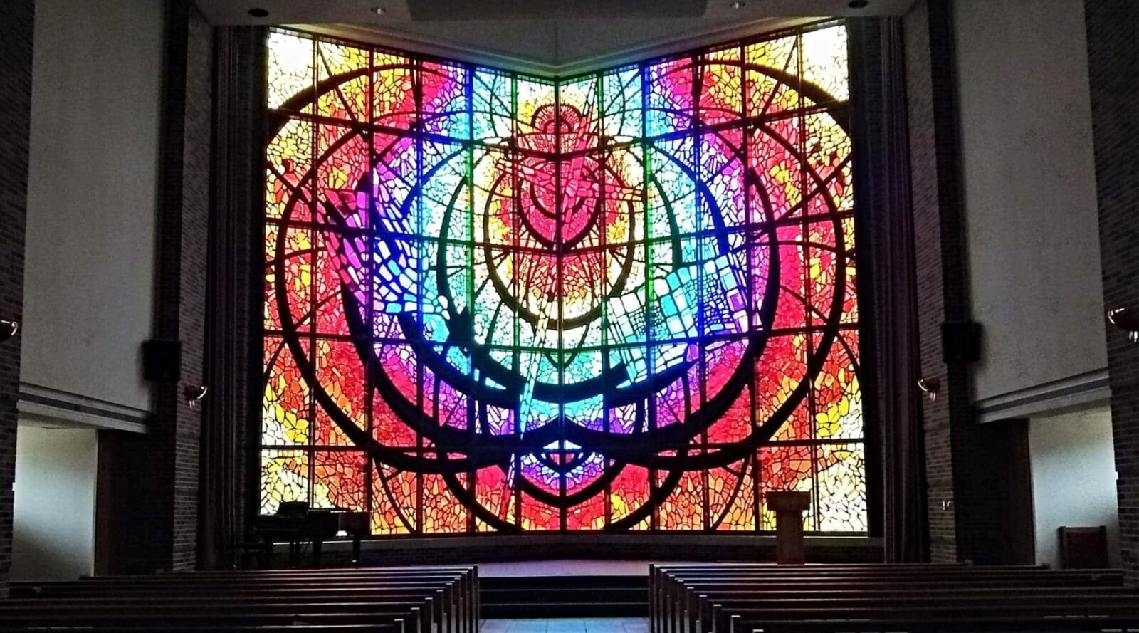 Logsdon Seminary chapel|Close-up profile of man’s face and hands in prayer