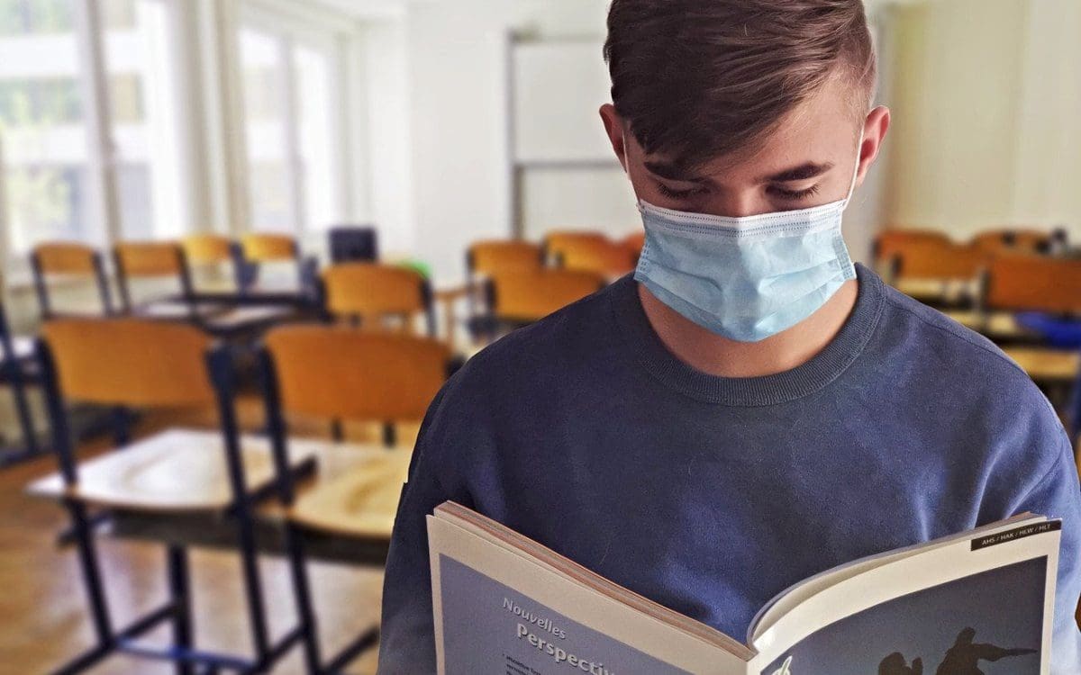 Student wearing mask in classroom