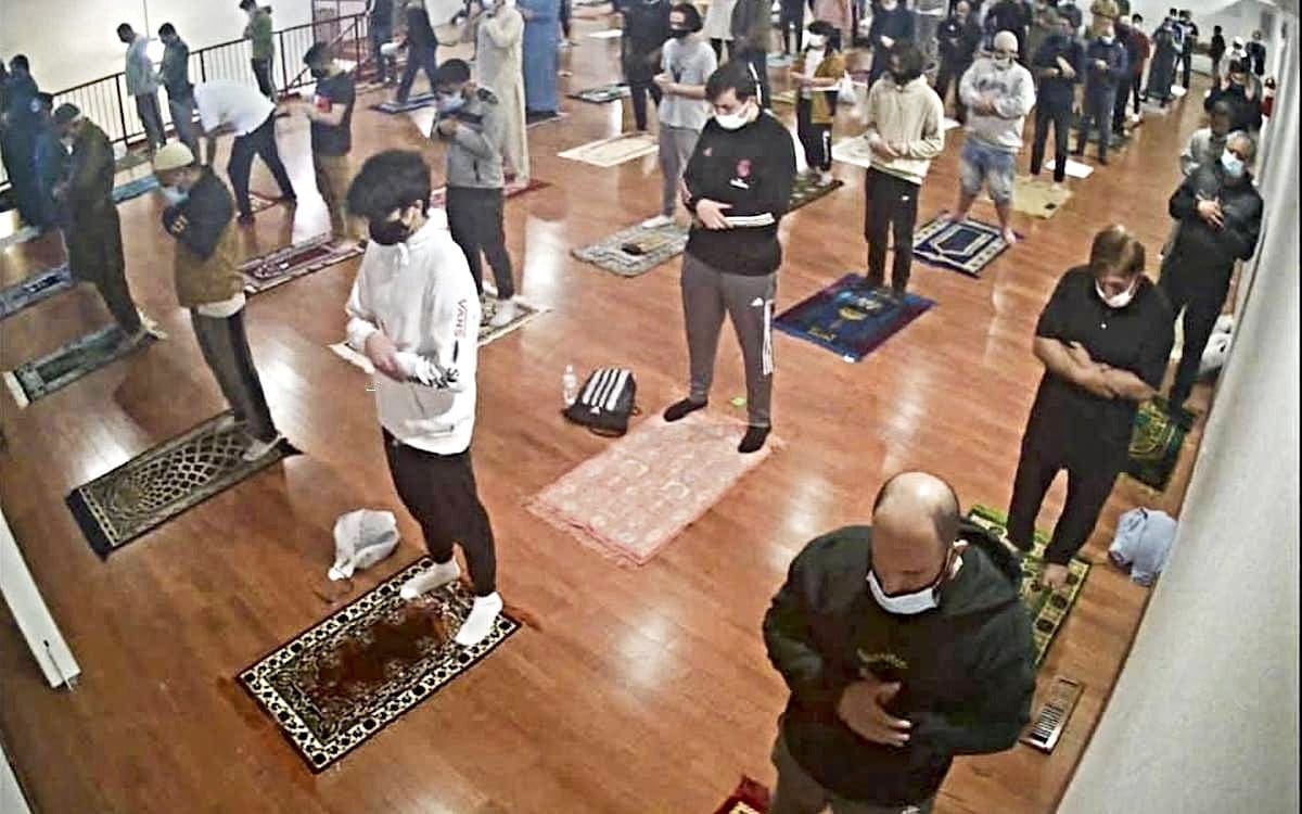 A daily prayer gathering at a mosque in Oklahoma City during the COVID-19 pandemic.|