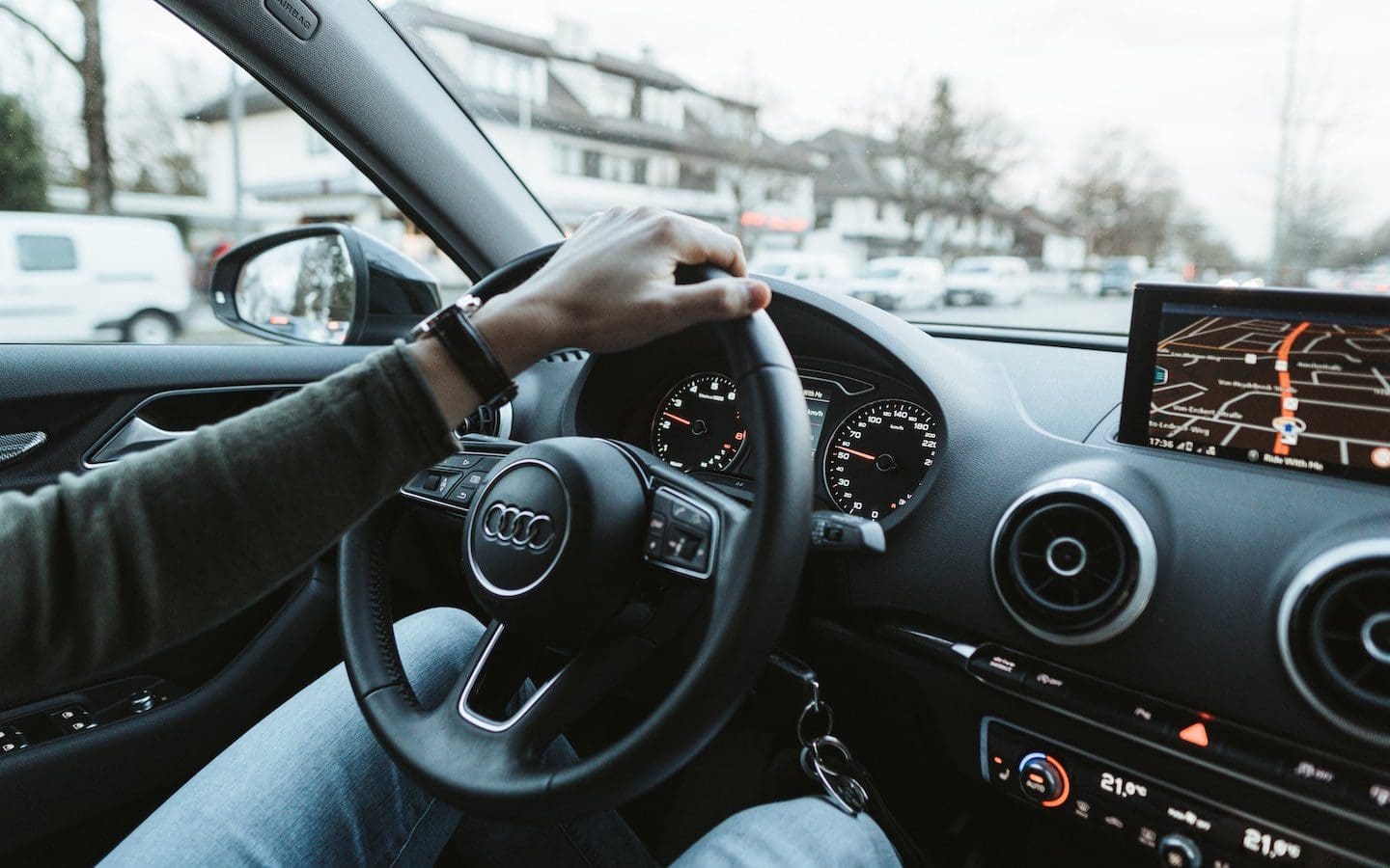 A person driving a car.