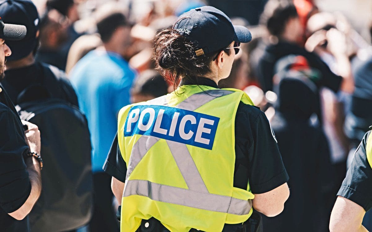 Back of woman police officer