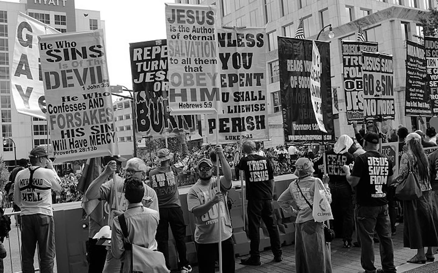 Protestors display religious slogans at Atlanta's Pride Parade in 2017.