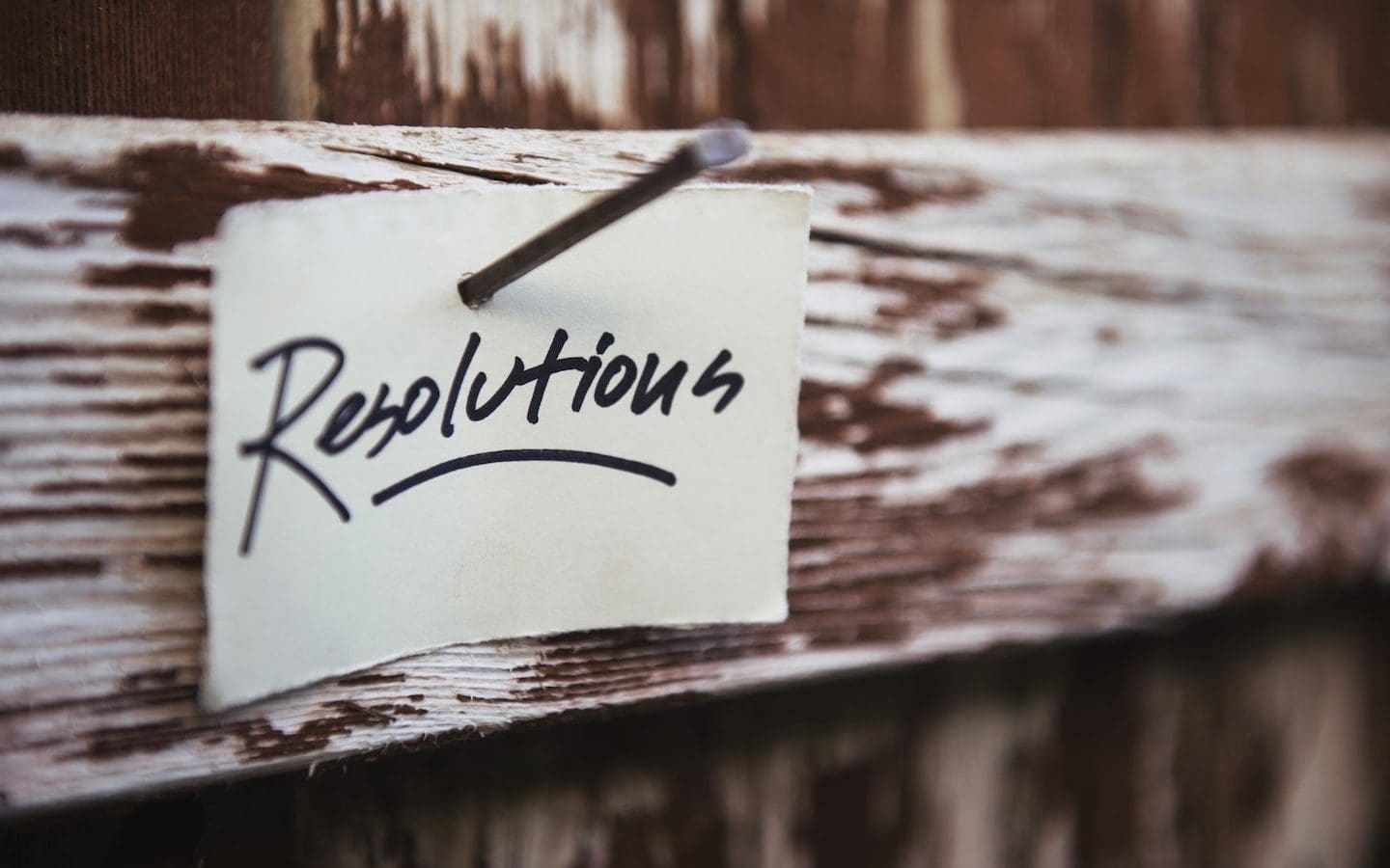 : A white notecard with the word