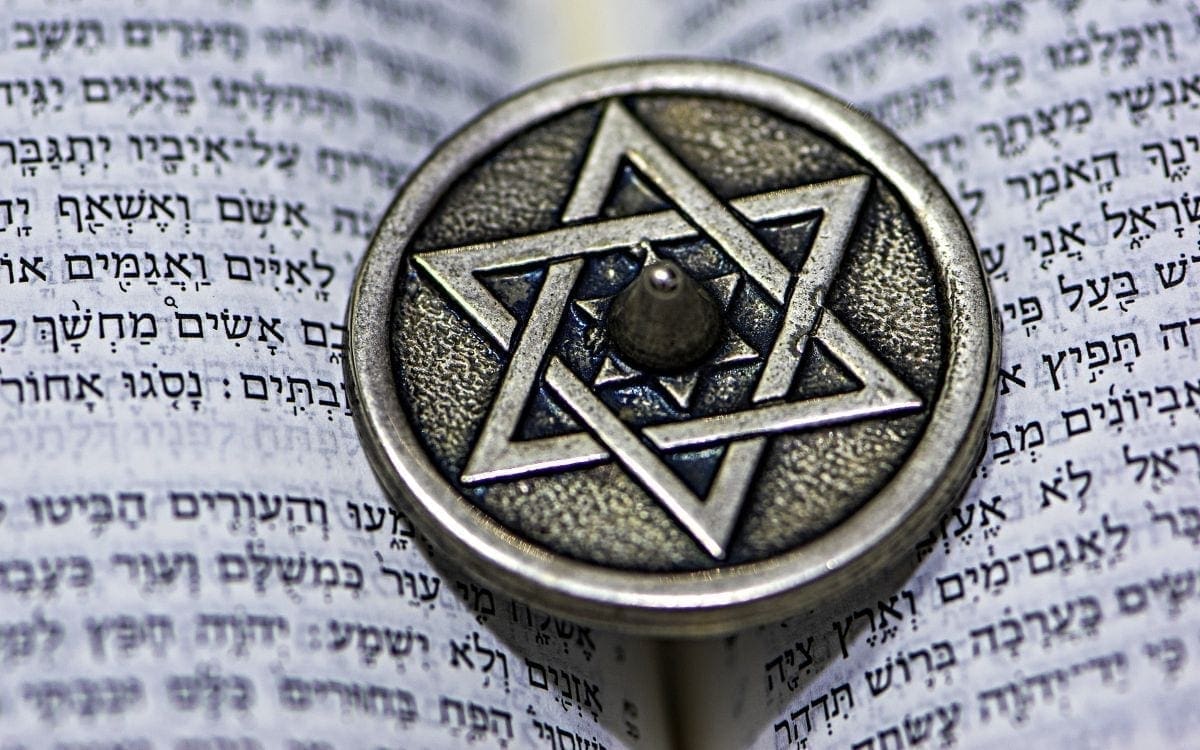 Star of David resting on Jewish scripture