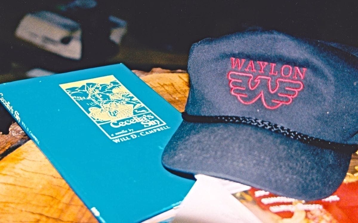 Waylon Jennings cap and Will Campbell book