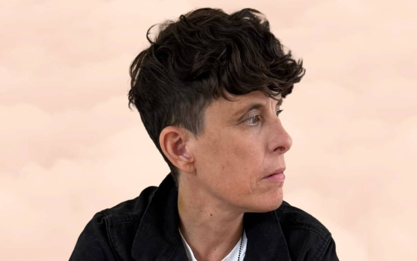 A headshot of Andrea Gibson.