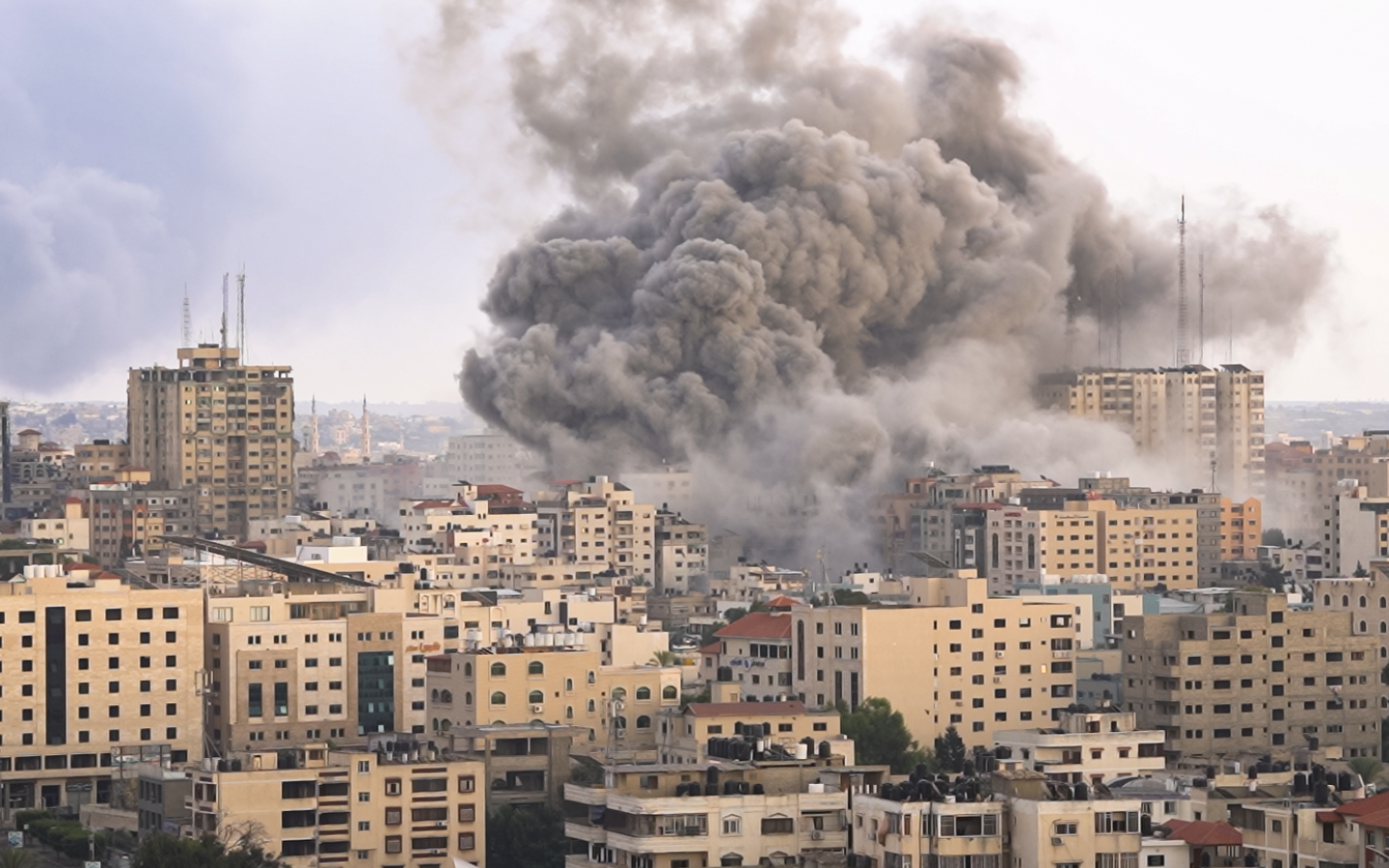 An image of an Israeli airstrike on a city in Gaza.