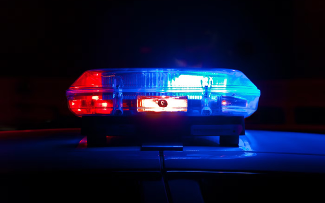 The red and blue light bars of a police car.