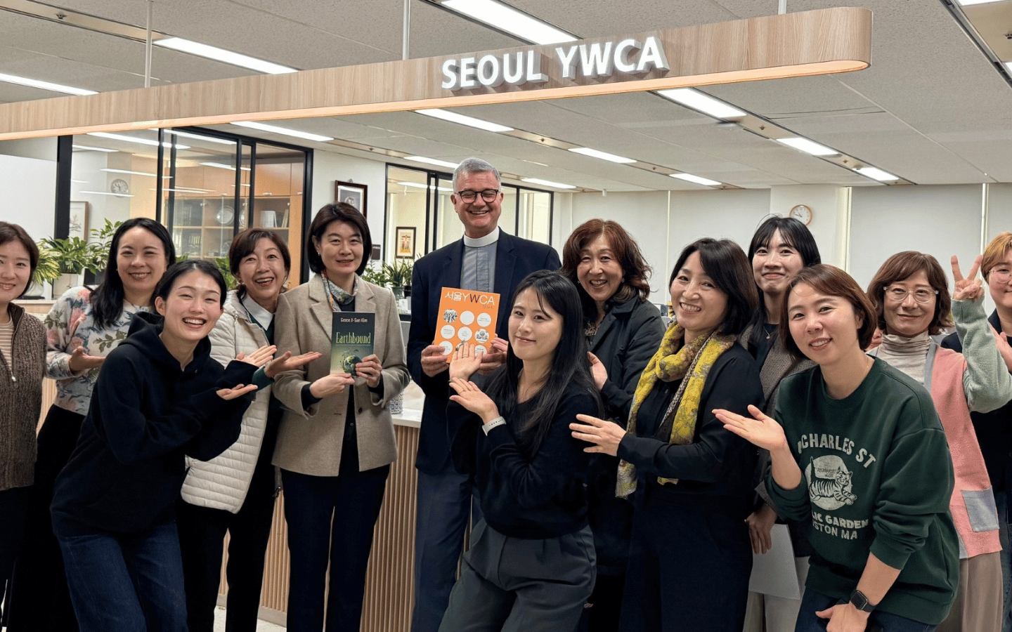 Grace Ji-Sun Kim poses with a group at the Seoul YWCA.