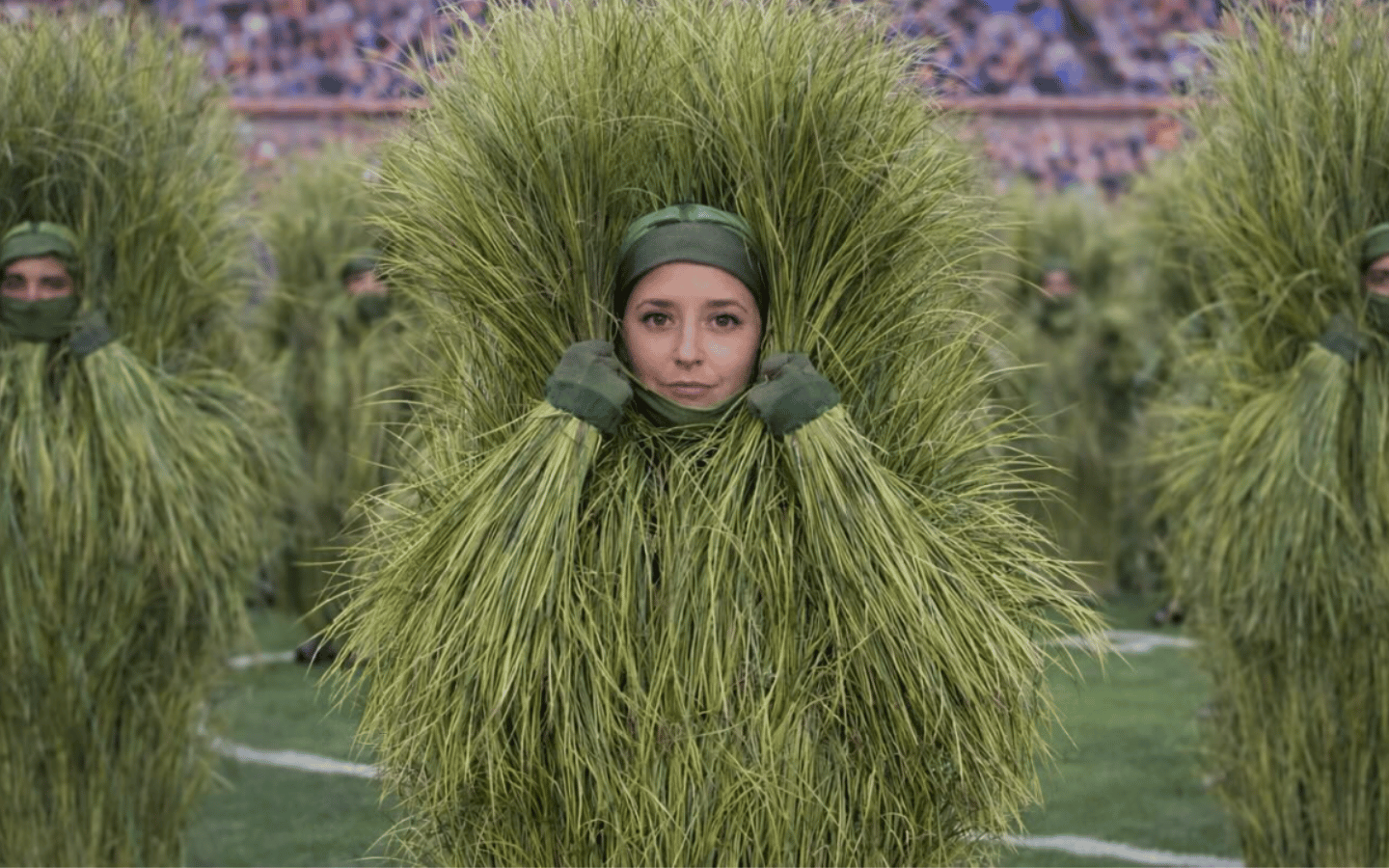 A performer wearing the grass/sugarcane costume at the Bad Bunny halftime performance at Super Bowl LX.
