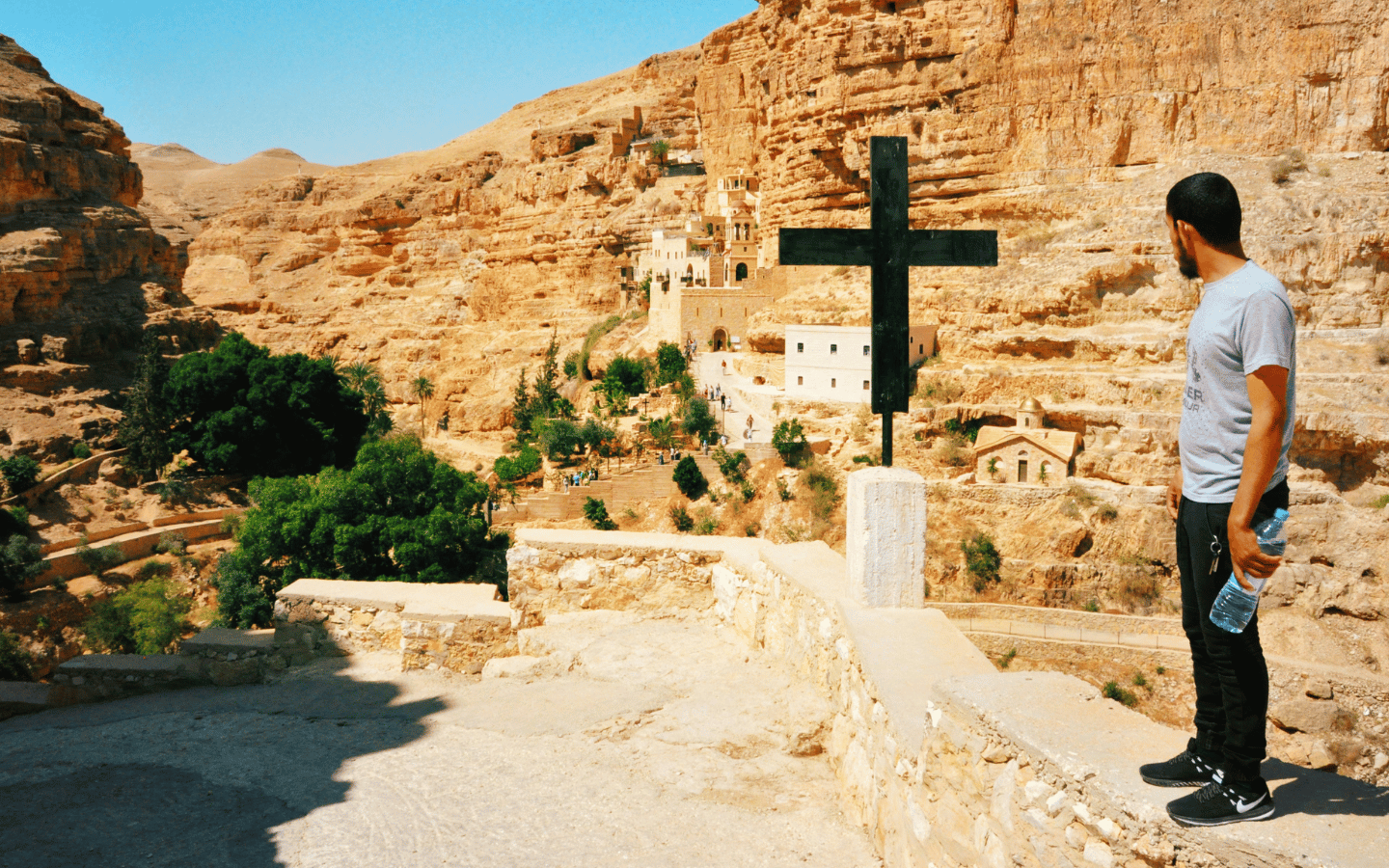 A Palestinian man looks at a cross near the city of Jericho.