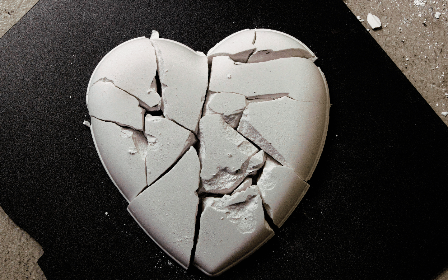 A stone heart shattered into pieces.