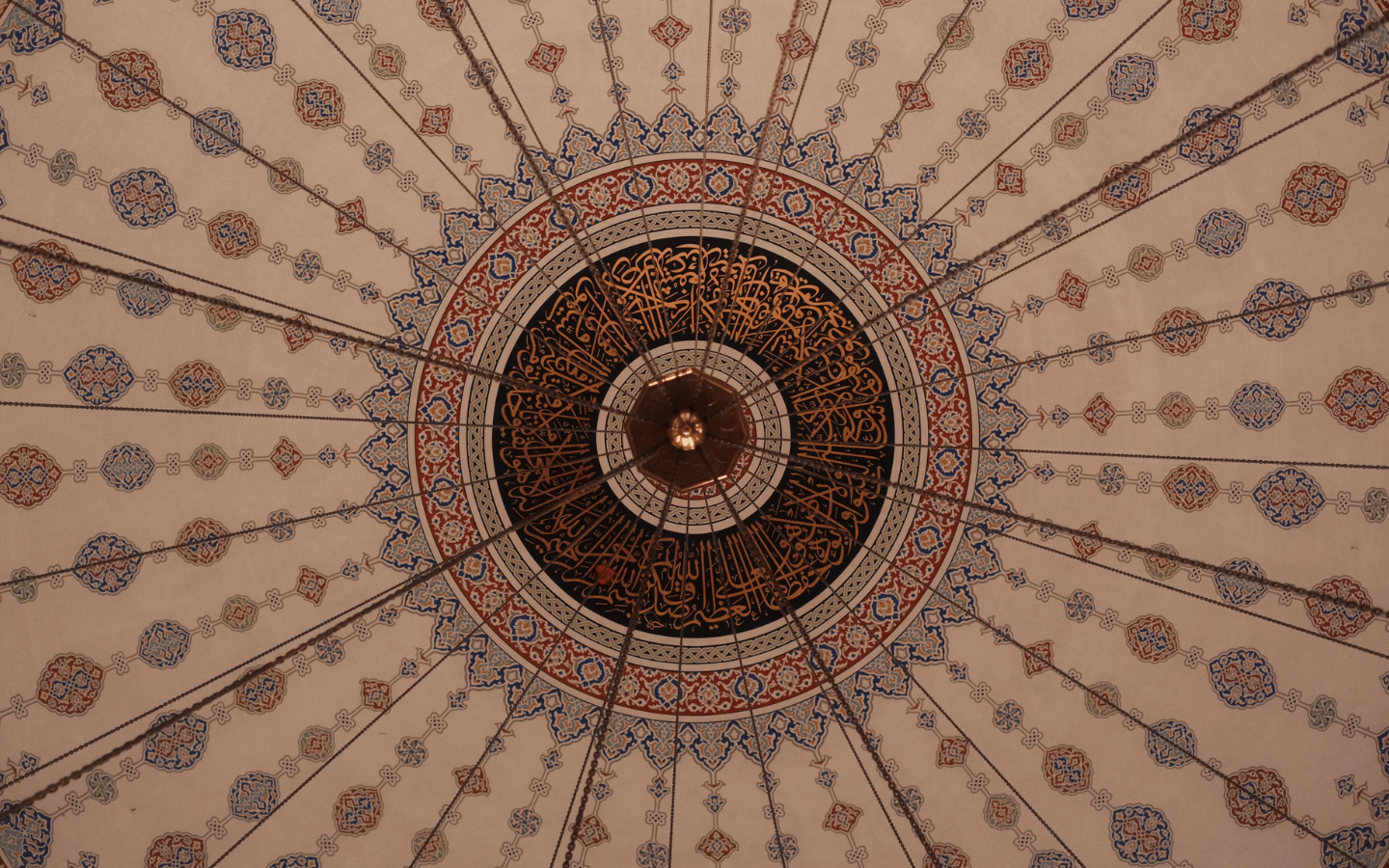 The artwork of an Islamic center dome.