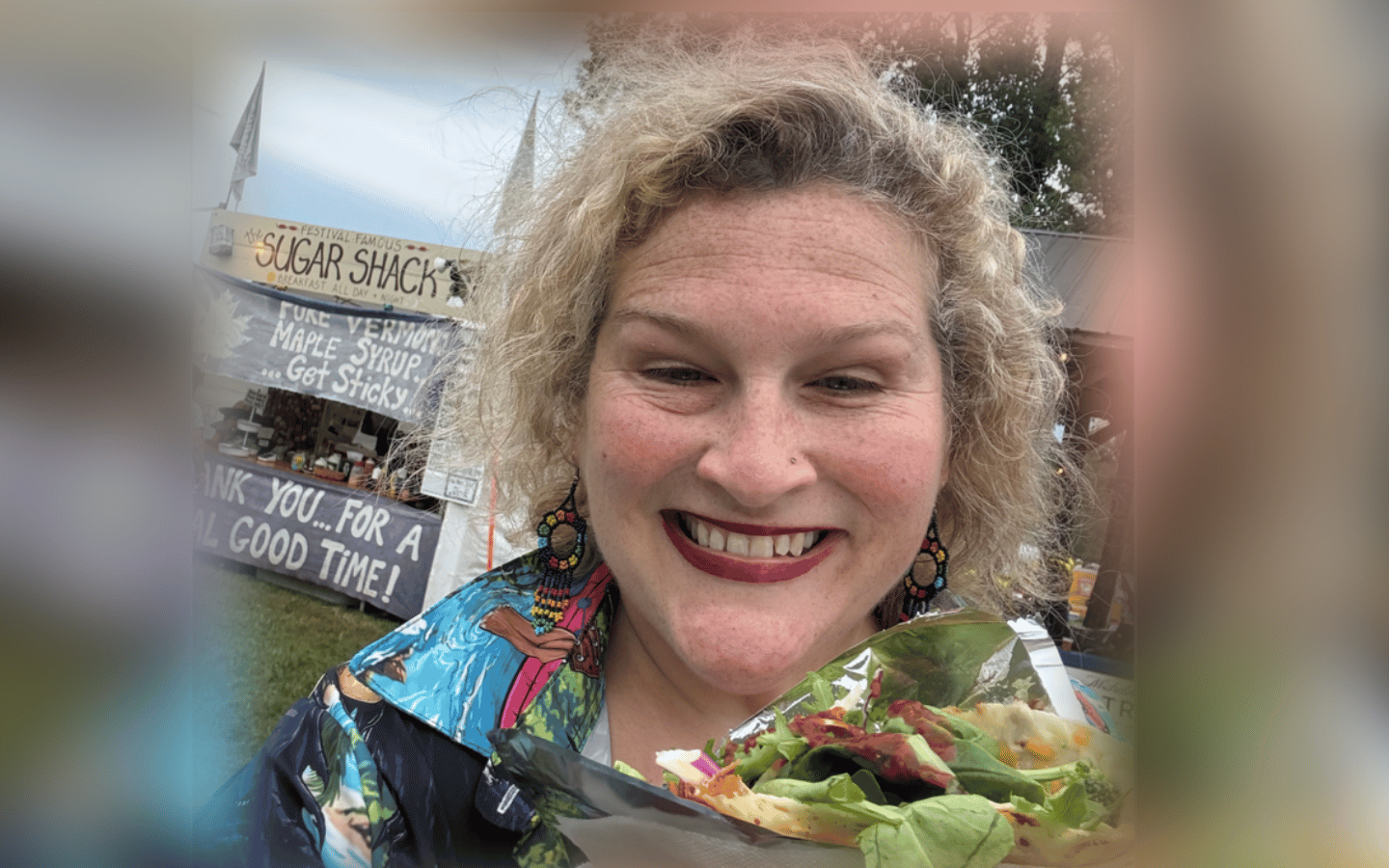 Jamie Marich holding a Veggie Thing at the 2026 Wild Goose Festival.